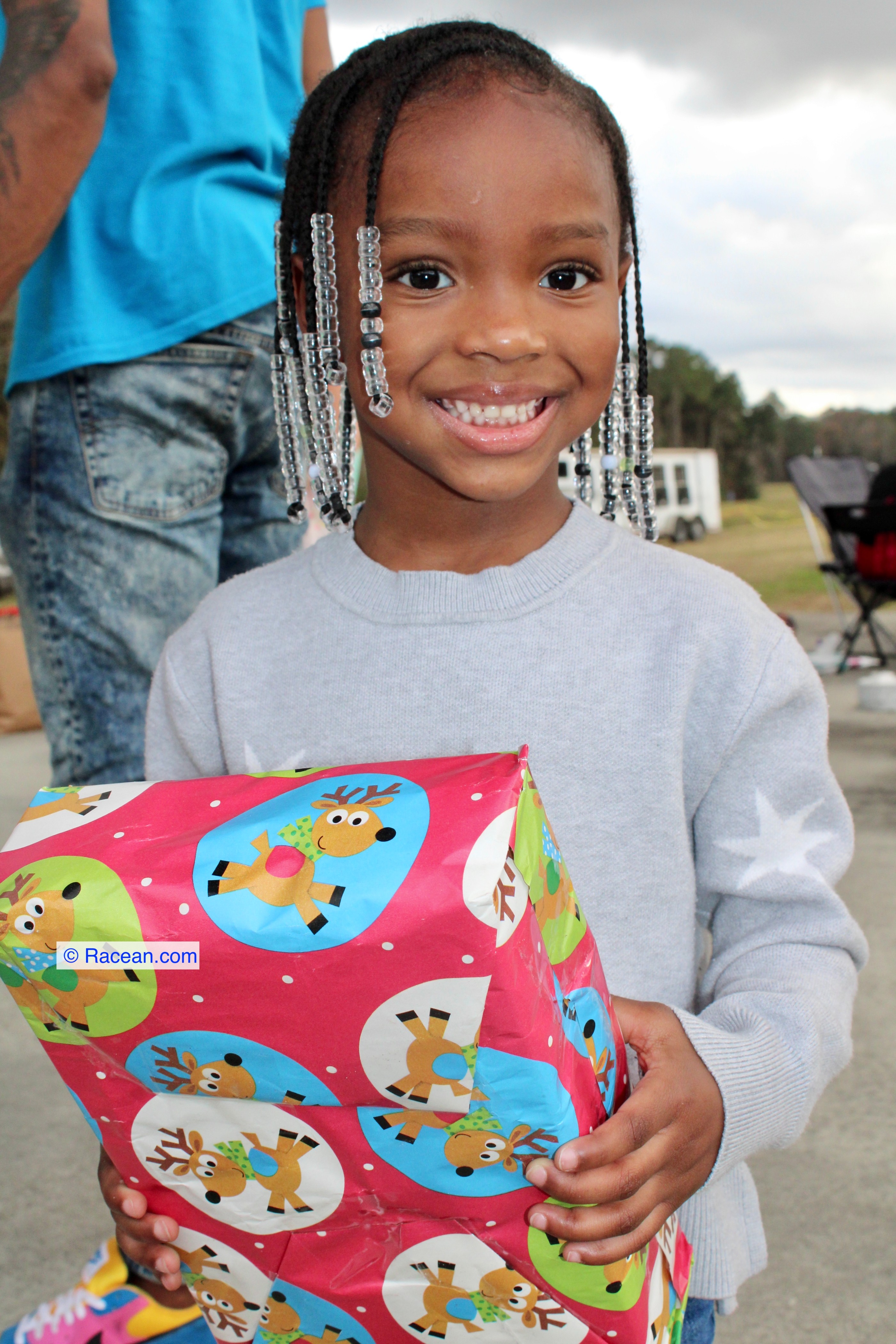 Smiling child at community event